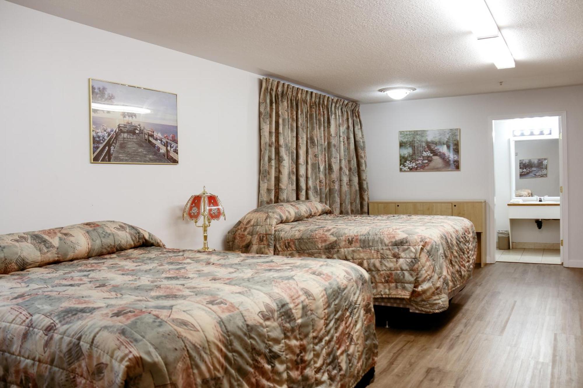 Western Budget Plus Mosaic Suites Penhold ภายนอก รูปภาพ